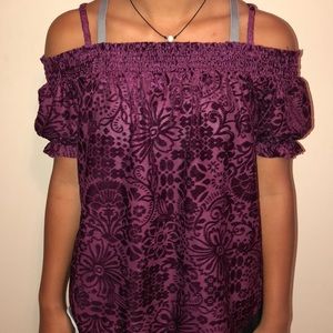 Off the shoulder maroon blouse.